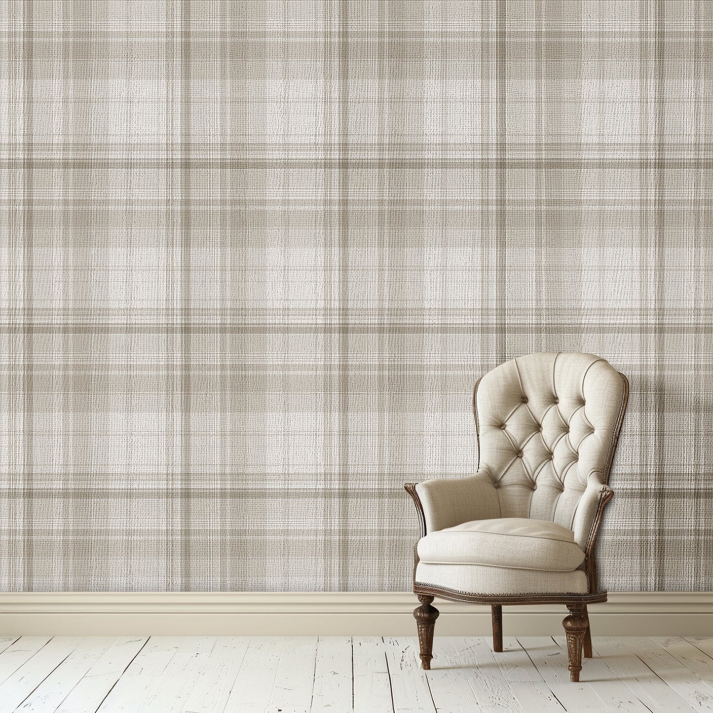 A classic interior scene featuring a beige tufted armchair with dark wooden legs placed against a neutral plaid wallpaper in soft taupe and cream tones. The room has white painted wood flooring and a calm, elegant aesthetic.