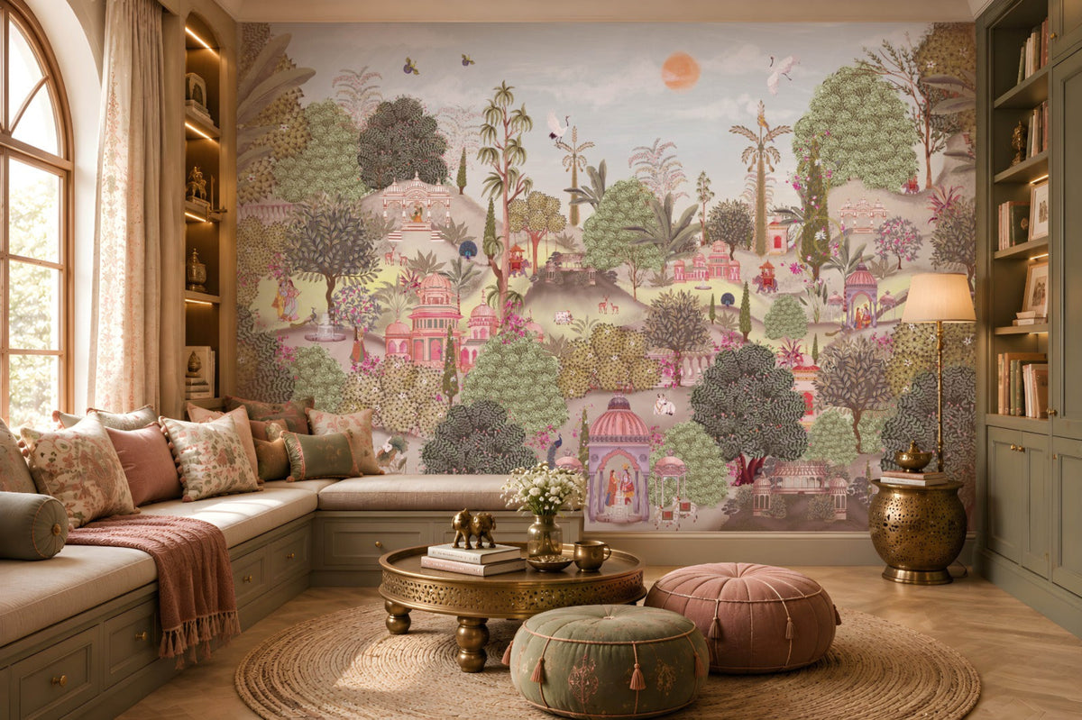 A cozy seating nook with a cushioned bench decorated with patterned pillows in beige, pink, and green. In front sits a small table holding two golden elephant figurines and a vase of white flowers. Behind, a large mural depicts a lush garden with domed pavilions, arches, flowering trees, and figures in traditional attire, creating an elegant and culturally inspired atmosphere.