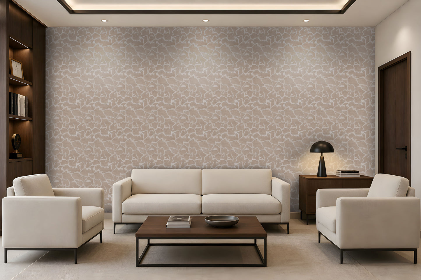 A modern living room featuring a large wall covered in beige and white abstract patterned wallpaper, styled with a cream sofa, two matching armchairs, a dark wood coffee table, and a black table lamp.