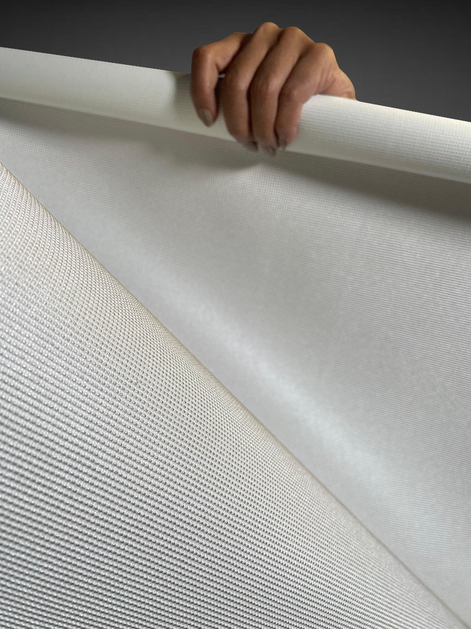 Close-up view of Waterproof Fabric Backed Commercial Wallcovering in Pearl White, showcasing a high-relief beaded grid texture and a moisture-resistant vinyl surface with a soft pearlescent sheen.