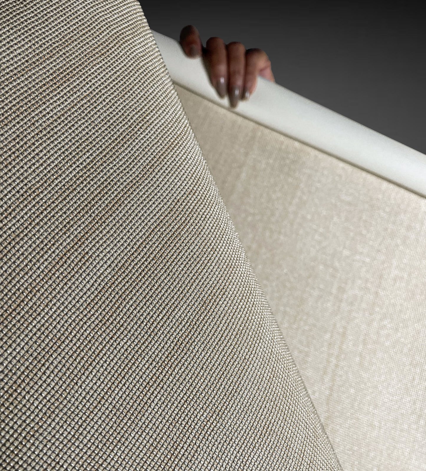 Close-up view of Waterproof Fabric Backed Commercial Wallcovering in Harvest Beige, showcasing a prominent raised grid texture and a moisture-resistant vinyl surface with a warm, earthy finish.