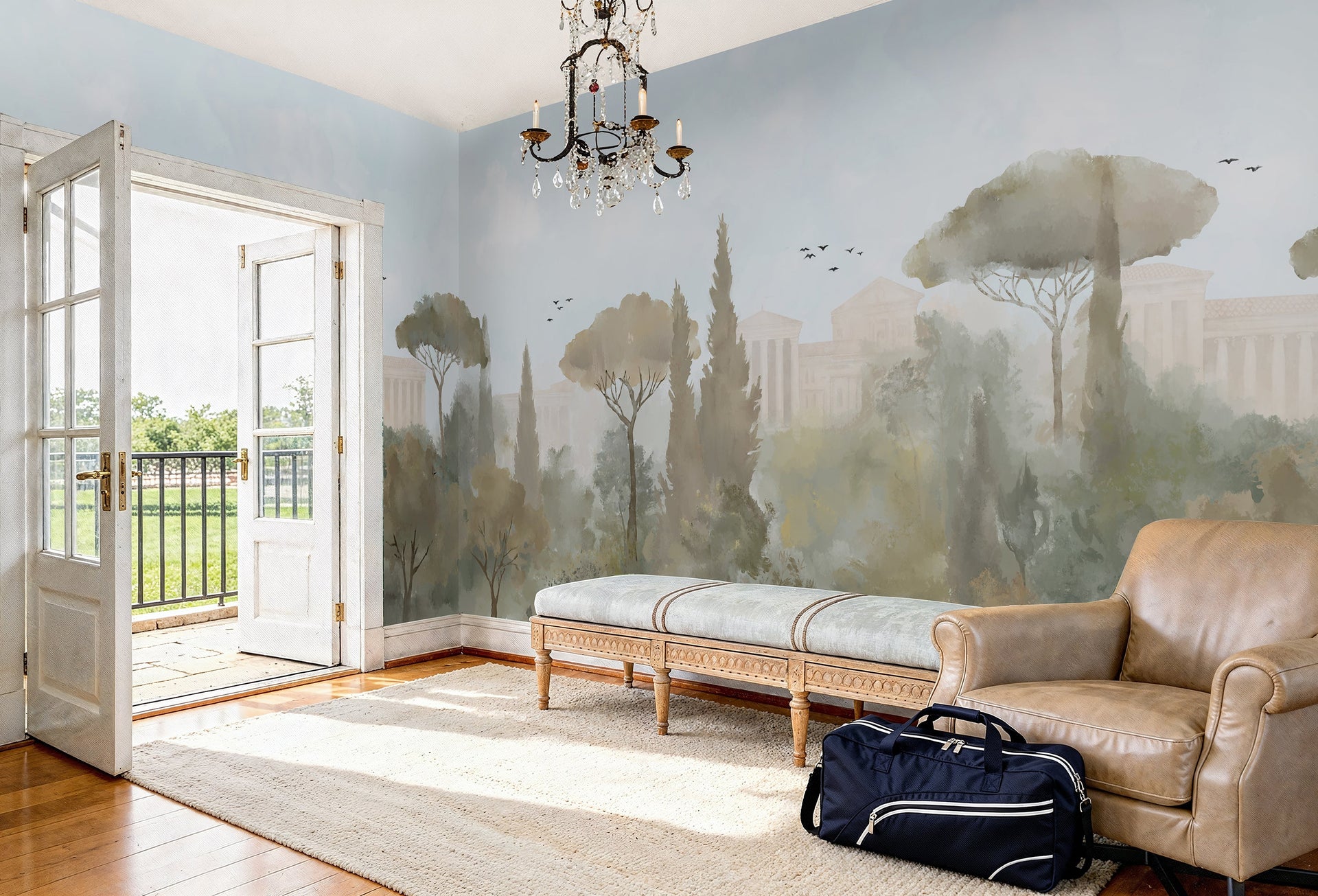 Wallpaper In Sadashivanagara. Water colour mural wallpaper in living room shows trees and vintage roman buildings, French doors to a balcony and chandelier.