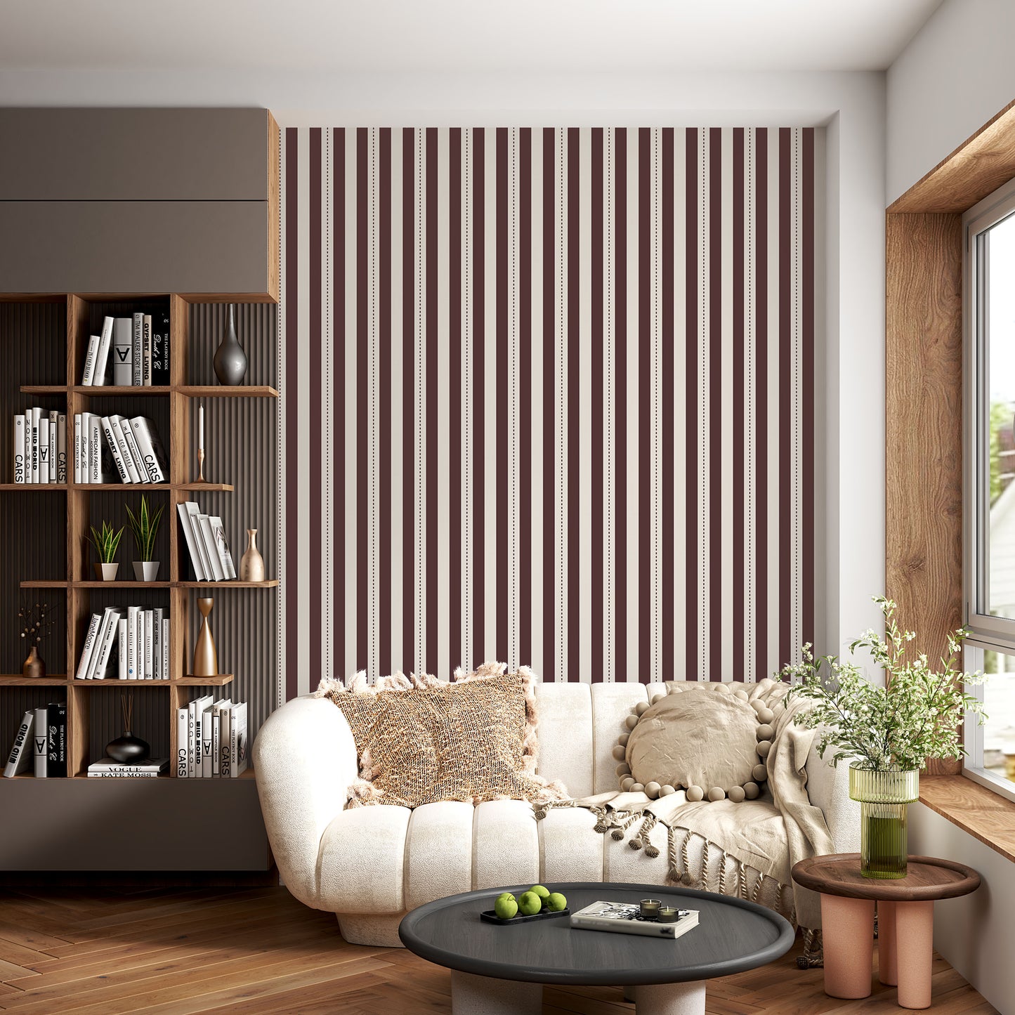 A creative workspace features a bold dark mahogany brown and beige striped wallpaper.
The detailed design shows clean vertical brown bands alongside beige stripes with thin dotted lines.
In front, a light wood desk table is neatly arranged with books, office supplies, and a clock.
The structured setup is grounded with a modern black stool and storage organizers.