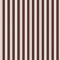 A creative workspace features a bold dark mahogany brown and beige striped wallpaper.
The detailed design shows clean vertical brown bands alongside beige stripes with thin dotted lines.
In front, a light wood desk table is neatly arranged with books, office supplies, and a clock.
The structured setup is grounded with a modern black stool and storage organizers.