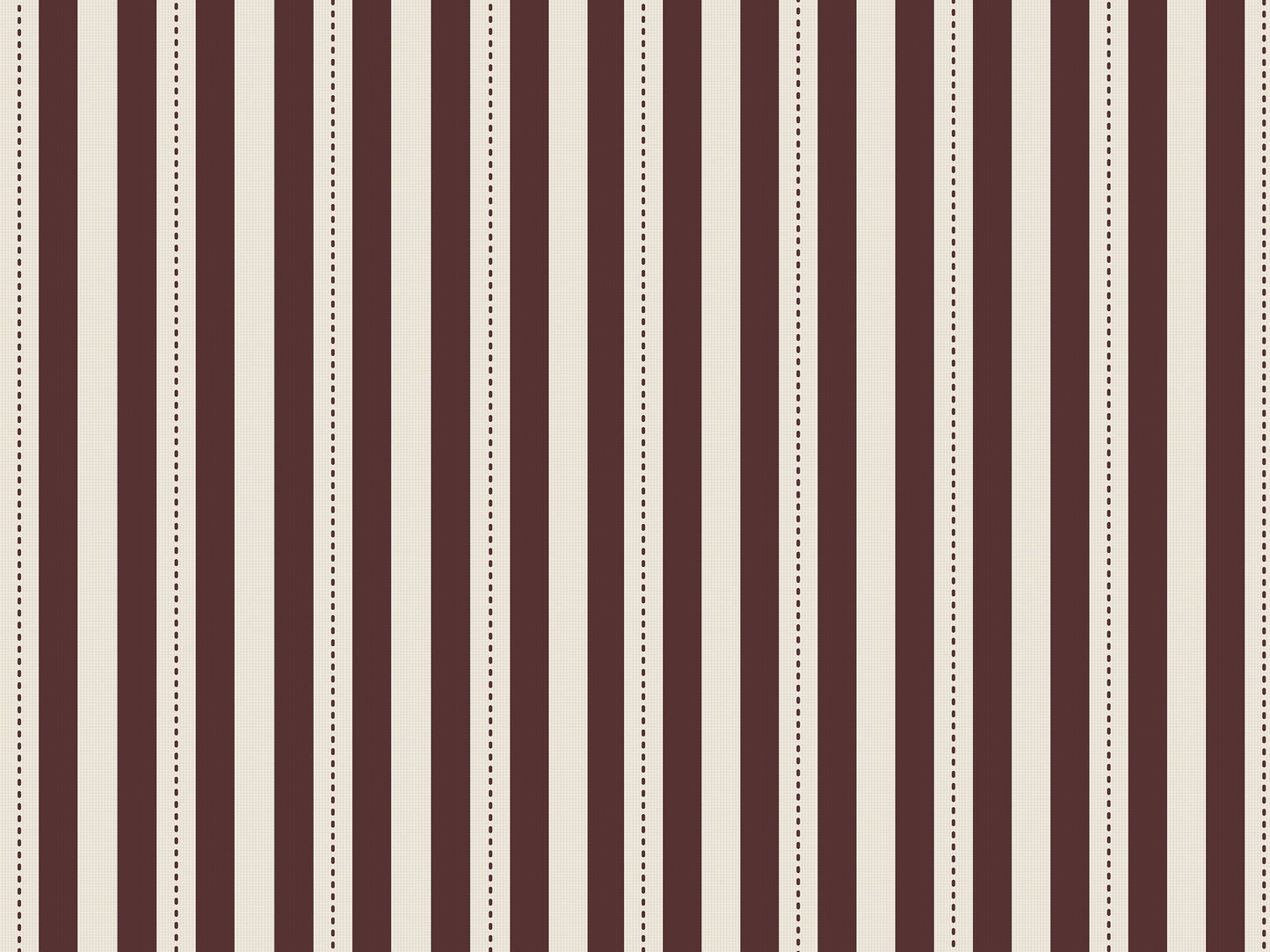 A creative workspace features a bold dark mahogany brown and beige striped wallpaper.
The detailed design shows clean vertical brown bands alongside beige stripes with thin dotted lines.
In front, a light wood desk table is neatly arranged with books, office supplies, and a clock.
The structured setup is grounded with a modern black stool and storage organizers.