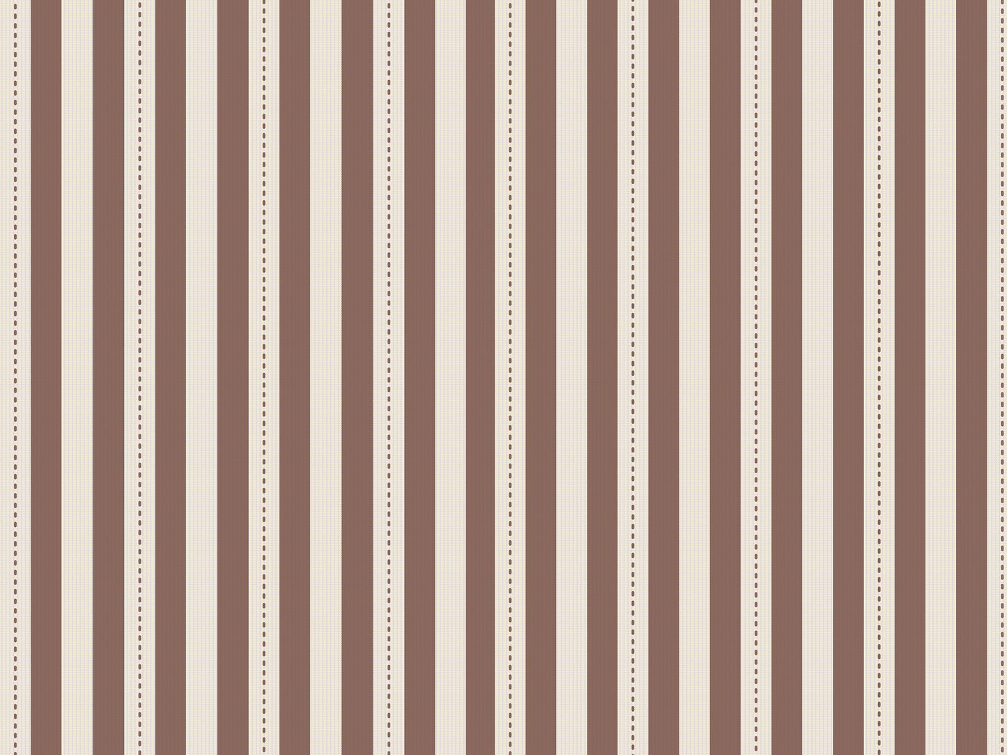 A warm, stylized workspace features a bold black and beige striped wallpaper.
The detailed design shows alternating vertical black bands and warm beige stripes.
In front, a light wood sawhorse desk table holds an assortment of books and office supplies.
The creative interior setup is completed with a black industrial pendant light and a stool.