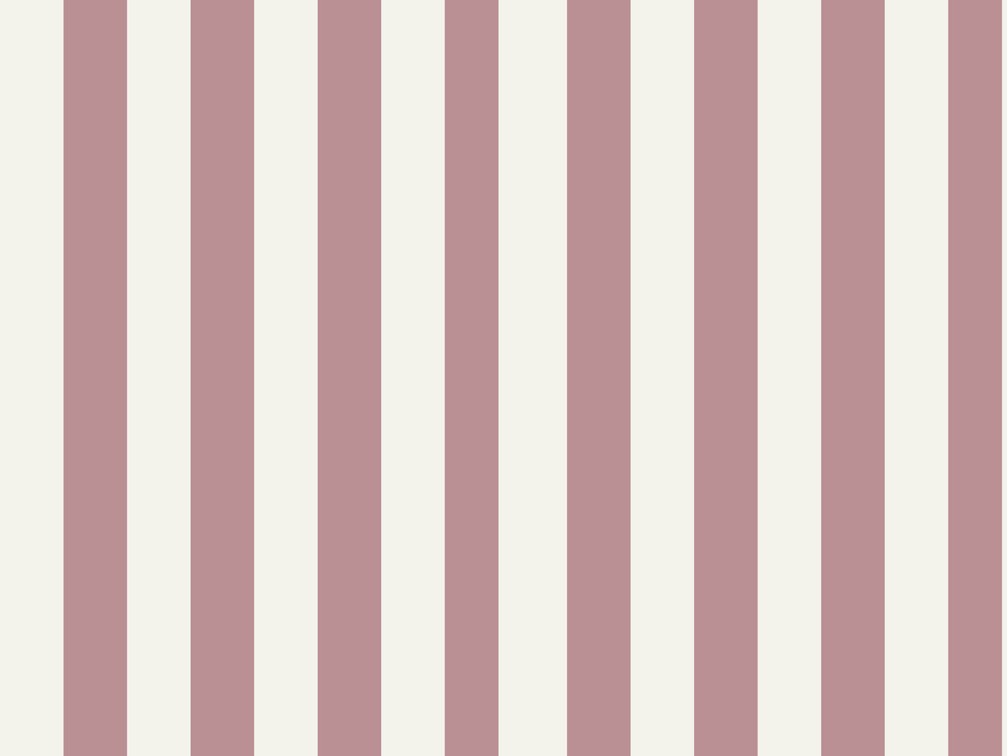 A stylish living room features a soft rosewood pink and white striped wallpaper.
The design showcases clean, evenly spaced vertical stripes across the expansive back wall.
In front, a plush cream-colored sofa and matching armchair frame sleek round coffee tables.
The modern, elegant space is complete with a geometric area rug and potted green plants.