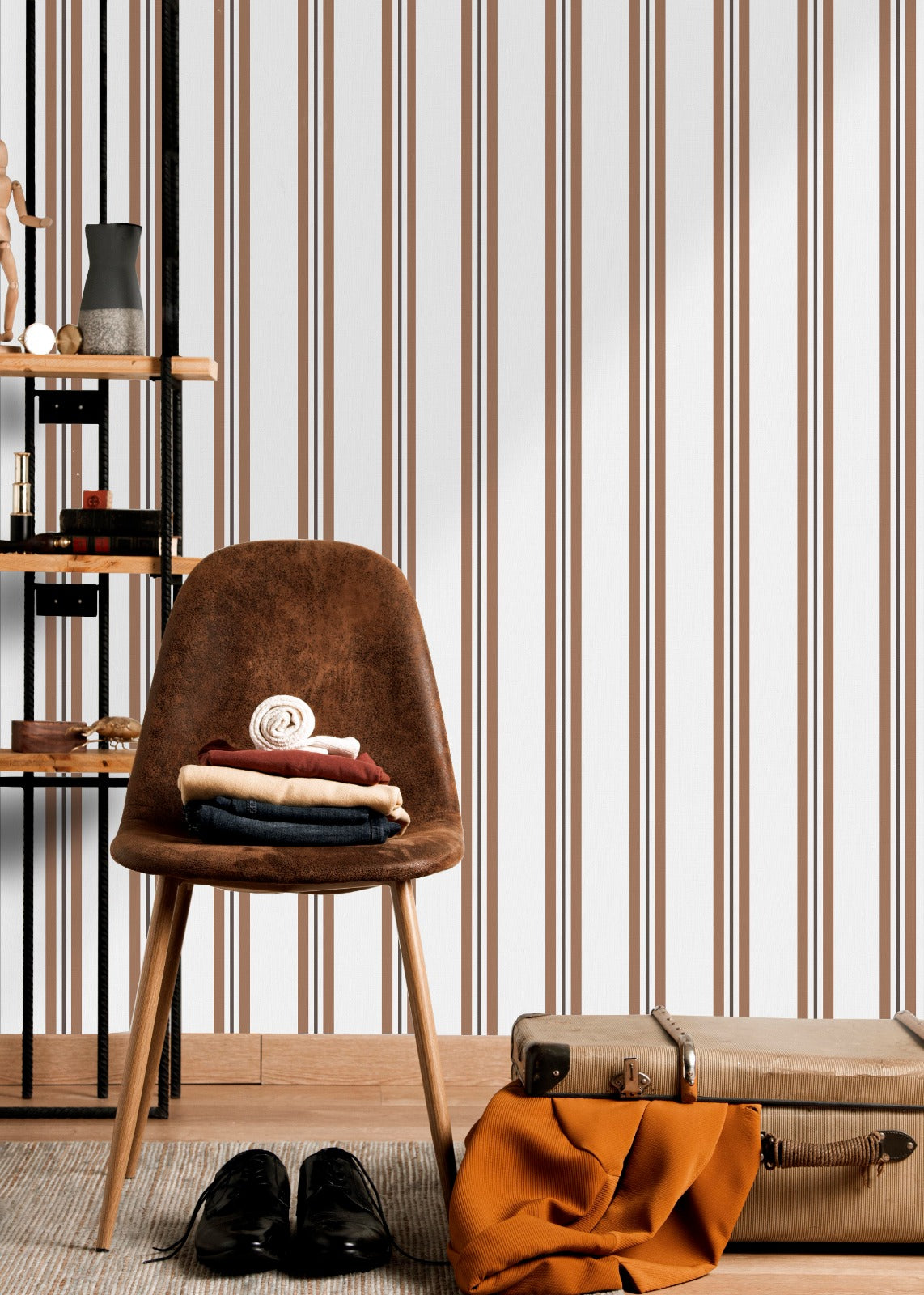 A warm dining area features a soft brown and white striped wallpaper.
The clean design shows vertical light brown lines repeating across a cream base.
In front, a sleek dark wooden table is paired with minimalist black chairs.
The sophisticated setup is completed by a contemporary black pendant light hanging above.