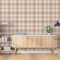 Peach plaid wallpaper featuring a soft checkered pattern in warm peach and beige tones, styled in a modern Scandinavian-inspired room with wooden furniture, indoor plants, and minimal decor, creating a cozy and elegant interior backdrop.