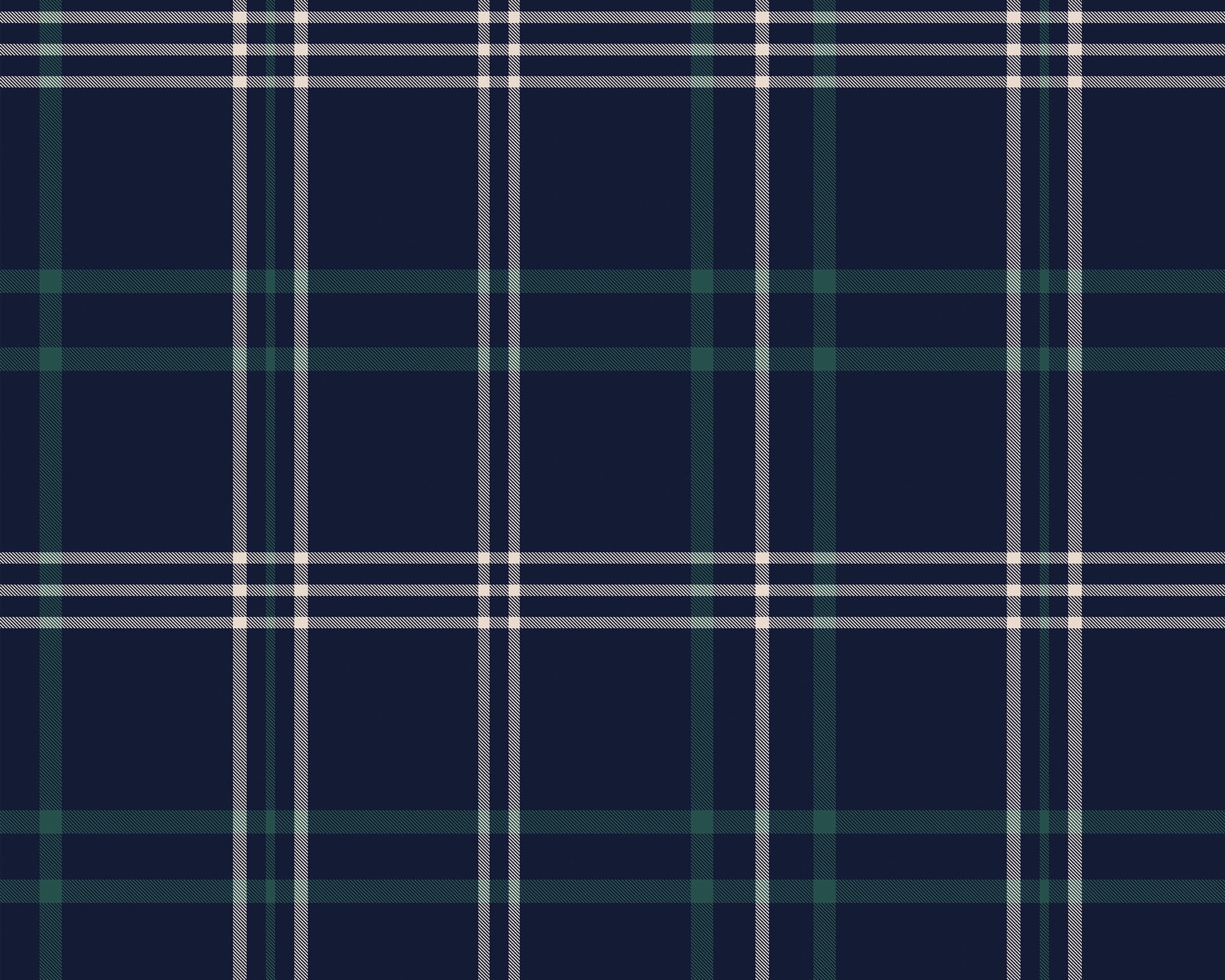 An interior setting highlights a dark navy blue wallpaper with a classic green and white plaid pattern.
In the foreground, a rustic light wood chest or table sits with subtle metal rivets along its top edge.
A large, textured terracotta vase with a rounded body rests on the left side of the wooden surface.
The vase is filled with leafy olive branches extending upwards, adding a vibrant touch of natural green.