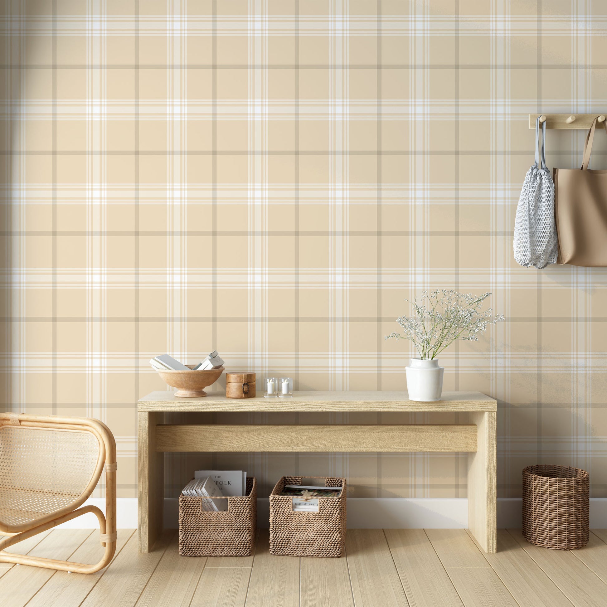 A stylish living area features a soft pale almond and off-white plaid wallpaper.
The detailed design shows intersecting light brown lines forming grids over a sandy base.
In front, a cream-colored wooden sideboard with woven rattan doors is centered nicely.
The serene setup is accented with a white desk lamp, pottery, and a leafy green plant.