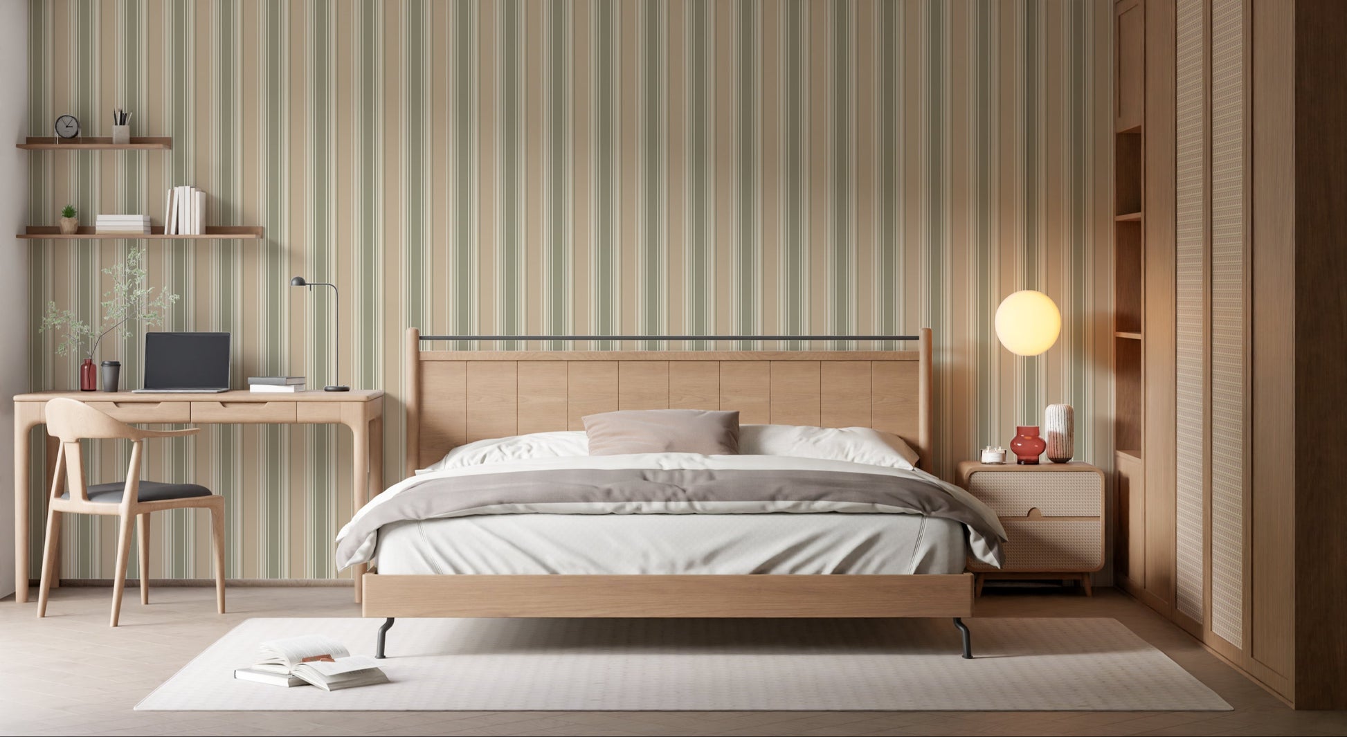 A warm, inviting bedroom scene showcasing a light wood paneled headboard against a wall covered in vertical dusty beige, cream, and muted olive green striped wallpaper. The bed is dressed with crisp white sheets, a brown duvet, and a dusty pink pillow. To the right, a wooden nightstand holds a small candle, a small reddish-brown glass vase, and a textured ceramic vase, all illuminated by the soft, warm glow of a round orb wall sconce.