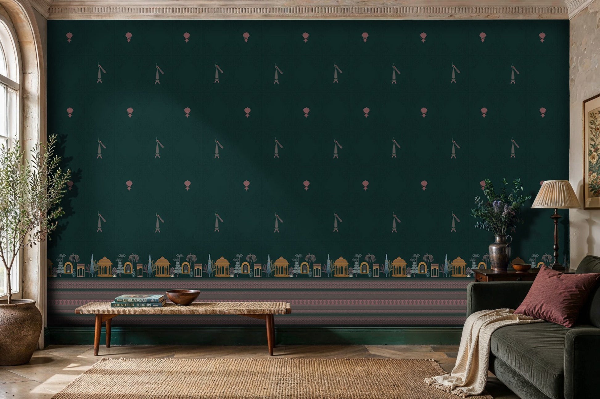 Royal Garden Heritage Wallpaper in Peacock Teal featuring delicate heritage motifs, floral accents, and a decorative palace-inspired border in antique gold and mauve, styled in a sophisticated living room with classic architecture, dark velvet seating, wooden furniture, and natural textures.
