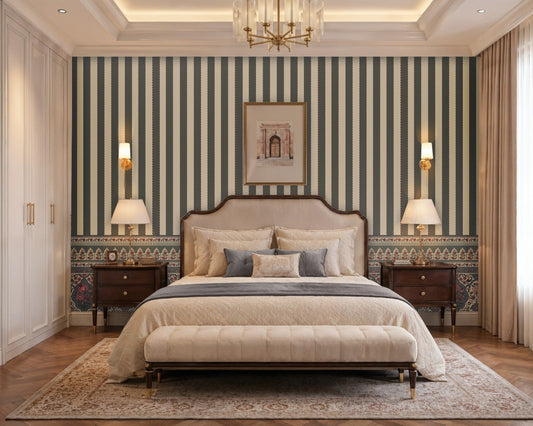 Elegant bedroom featuring 1371_DA Rajmahal Heritage Stripe Wallpaper in slate grey with classic vertical stripes, decorative heritage border, upholstered bed, wooden nightstands, and warm luxury interior décor.