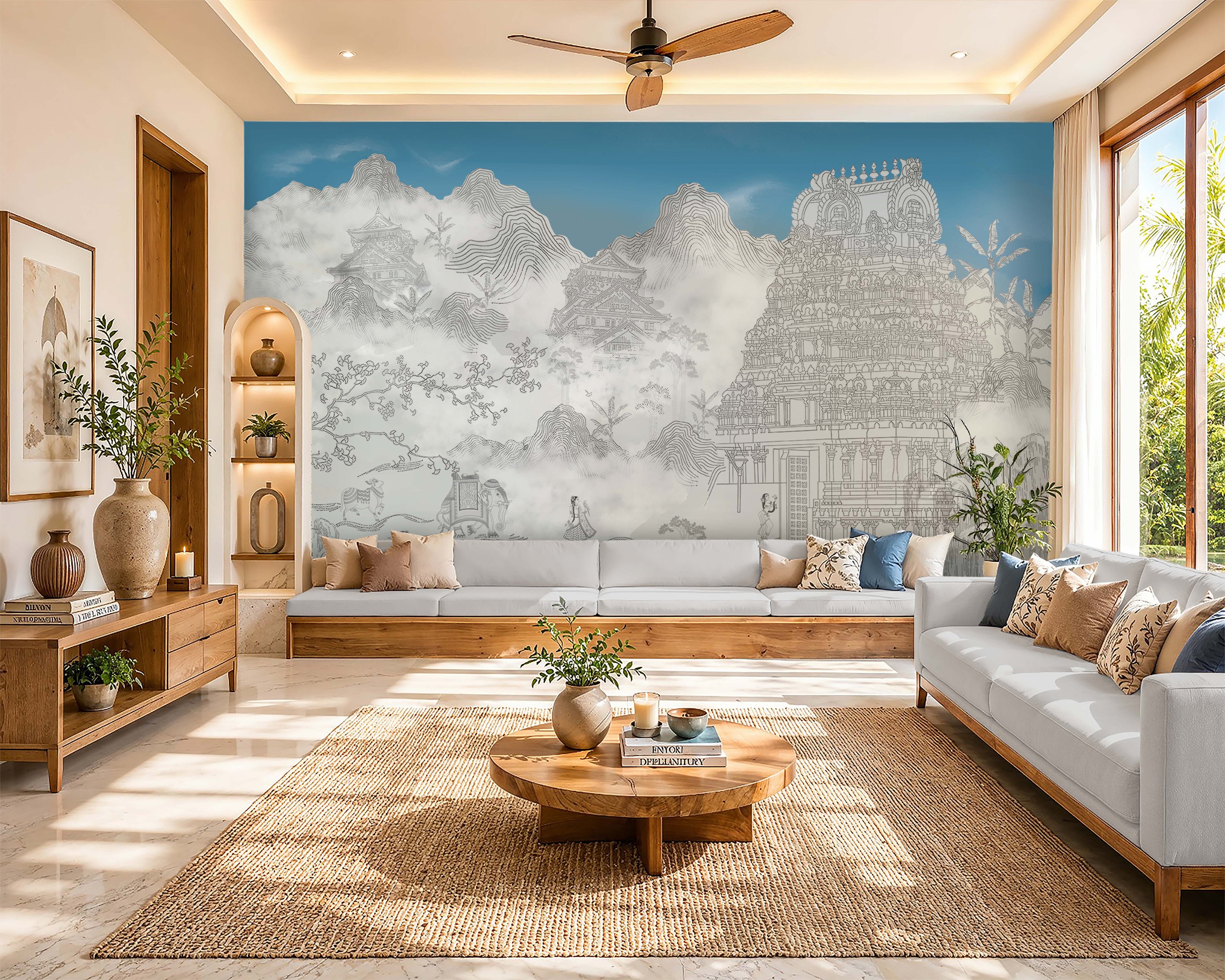 Indo-Zen Heritage Mural in Sky Blue featuring intricate Indian temple architecture, misty mountain landscapes, and Japanese-inspired line art as a statement wall in a modern living room with wooden furniture and neutral décor.