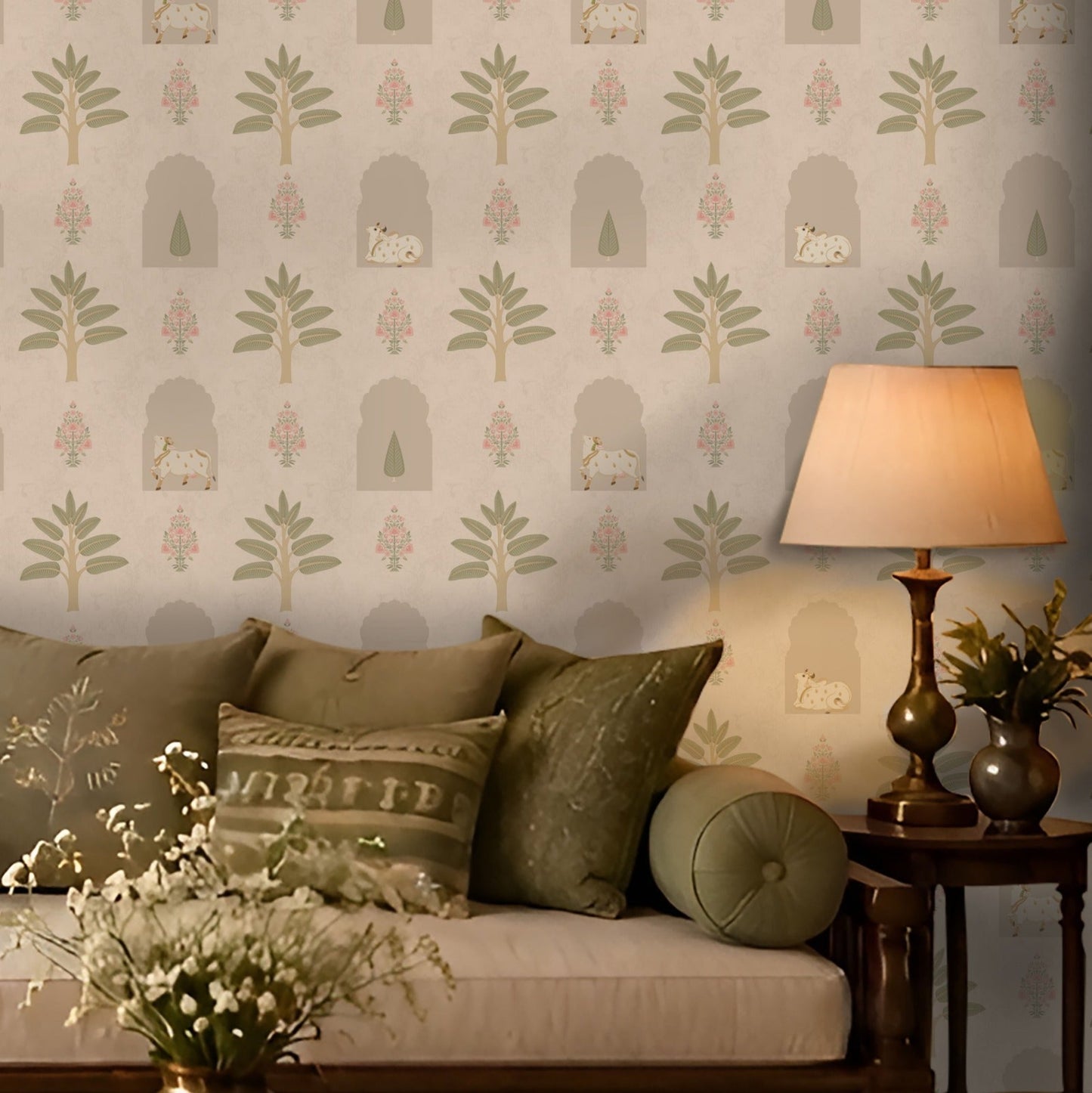 Warm beige heritage-inspired wallpaper featuring hand-illustrated trees, floral sprigs, arches and cow motifs, adding subtle elegance to a classic living room setting.