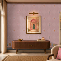 Elegant living room featuring soft pink Mughal-inspired wallpaper with delicate floral motifs, peacock accents, and heritage architectural border designs. Styled with a mid-century wooden console, framed artwork, warm lighting, and contemporary décor for a refined Indian-inspired interior.