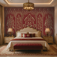 Luxurious bedroom featuring a regal crimson and gold Gulmohar floral wallpaper with Mughal-inspired botanical panels, elegant bird motifs, and intricate heritage detailing. The rich wallpaper complements a classic upholstered bed, warm ambient lighting, ornate furnishings, and timeless Indian-inspired interior décor.