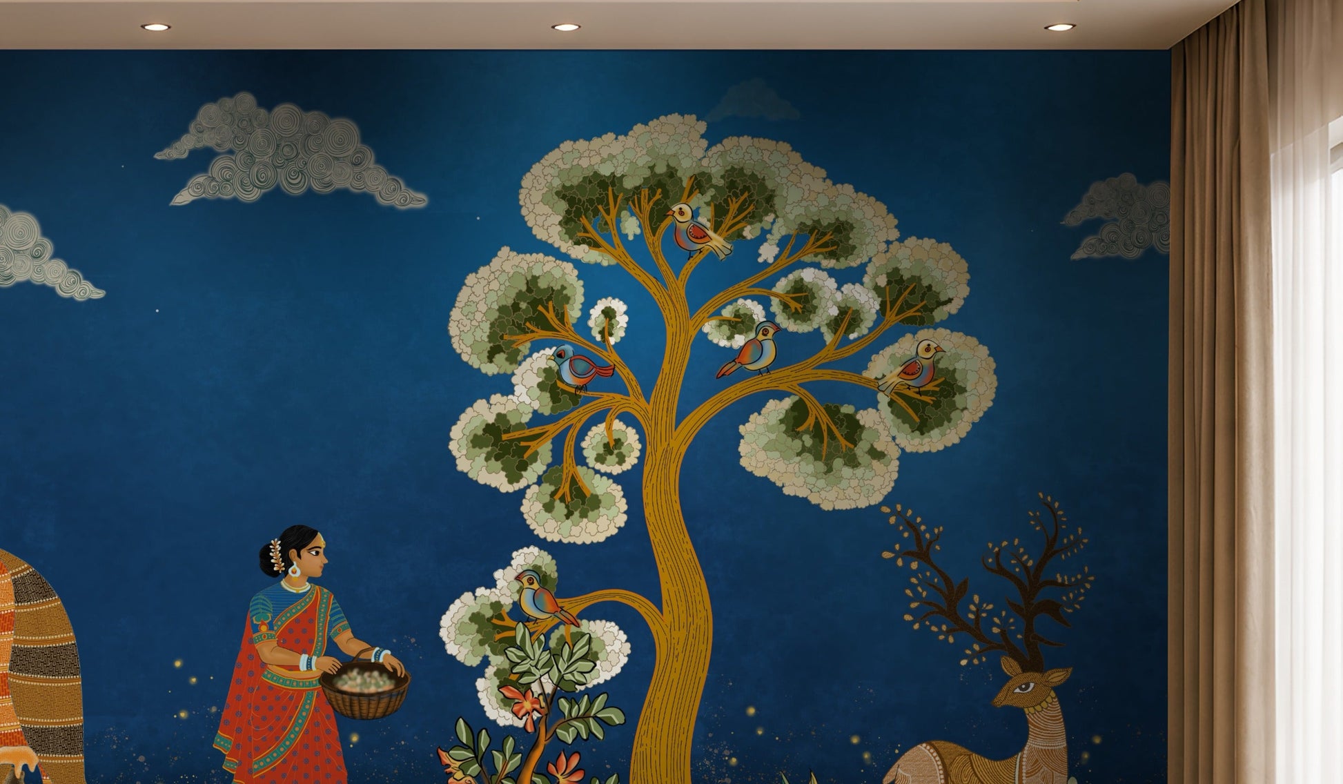 Traditional Gond Art wallpaper in royal blue featuring hand-painted Indian folk art with trees, birds, wildlife, and village life, displayed as a luxury living room feature wall.