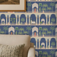 Royal Courtyard Reverie Wallpaper in Royal Indigo featuring elegant Indian palace arches, domed pavilions, lush palm trees, and heritage-inspired botanical motifs, creating a luxurious wall mural for living rooms, bedrooms, hallways, and statement interiors.  