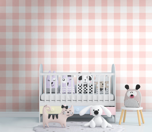 A charming room features a soft pastel checks wallpaper in a peach theme.
The delicate design displays a clean grid pattern with intersecting pink and cream lines.
In front, a small wooden table holds a white vase with small pink flowers.
The sweet, bright interior space creates a warm, simple, and comforting atmosphere.