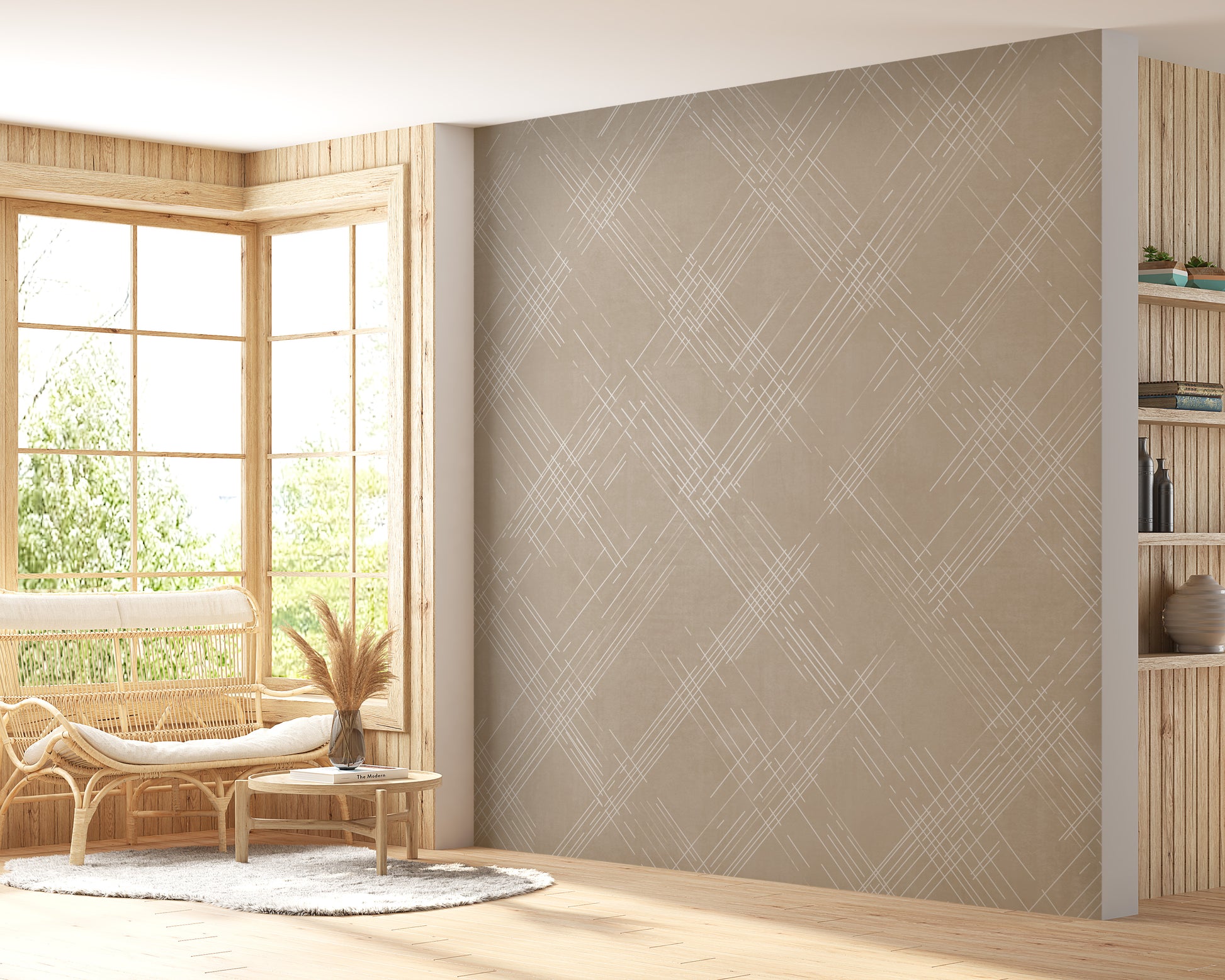 A bright living room features a textured crosshatch wallpaper in a warm beige theme.
The fabric-look pattern displays intersecting white sketch lines angled dynamically over a sandy beige backdrop.
In front, a cozy white sofa with colourful textured pillows sits next to a light wood lounge chair.
The sunny, welcoming interior space is beautifully completed by a tall, leafy green potted plant.