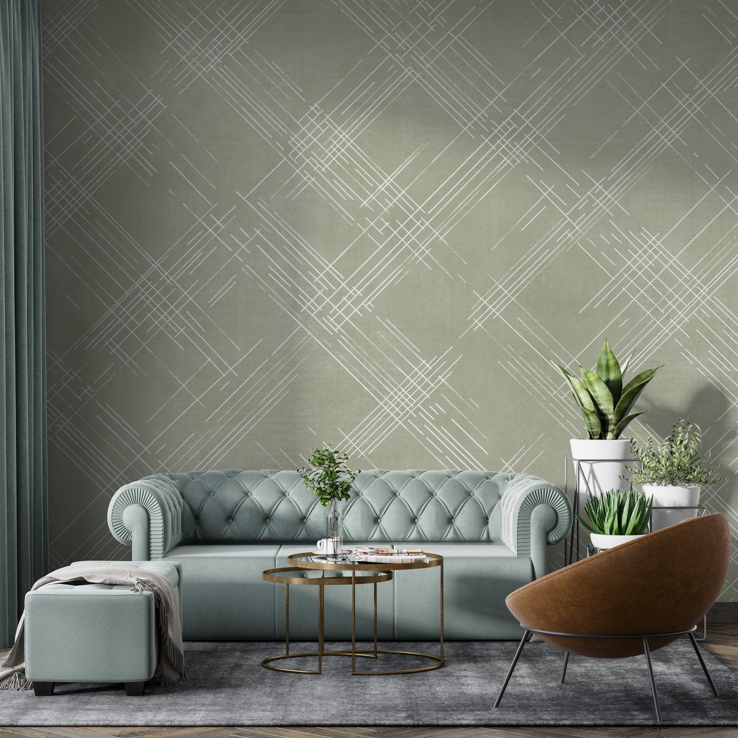 A contemporary living room features a textured crosshatch wallpaper in an olive grey theme.
The fabric-look pattern displays intersecting white sketch lines layered across a muted olive green backdrop.
In front, a comfortable white sofa with grey throw pillows sits behind a round amber glass coffee table.
The calm and stylish interior space is completed by a large leafy green potted plant on the left.