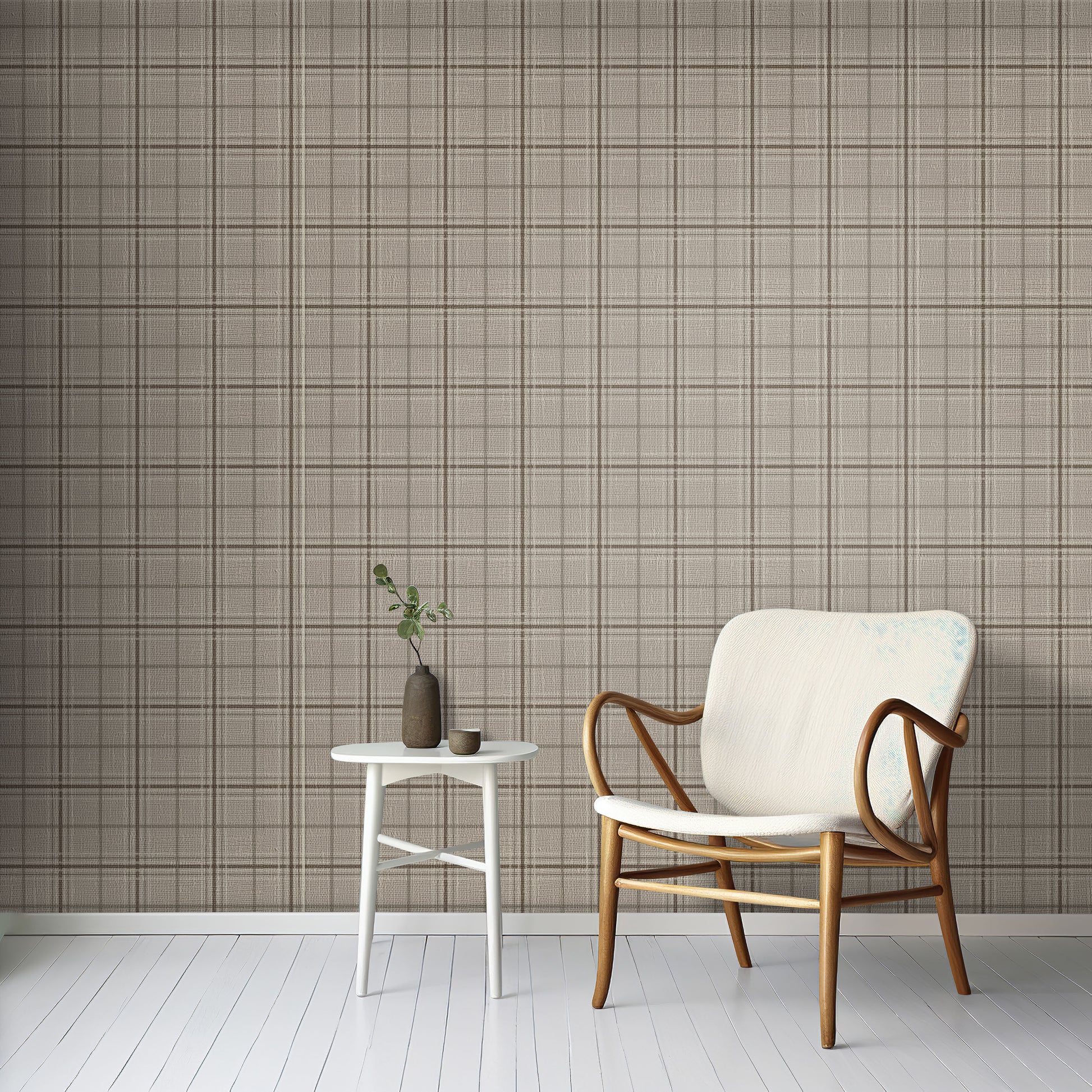 A minimal living room features a textured plaid wallpaper in desert dune tones.
The fabric-look pattern displays a structured grid with intersecting warm beige and soft tan lines.
In front, a comfortable light grey fabric sofa with a beige accent pillow is positioned on the right.
The clean interior setup is nicely completed by a dark grey wooden storage cabinet on the left.