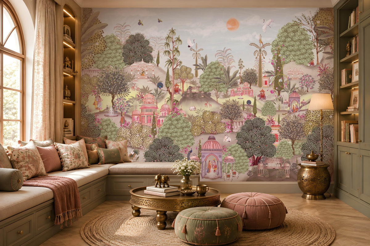 A cozy seating nook with a cushioned bench decorated with patterned pillows in beige, pink, and green. In front sits a small table holding two golden elephant figurines and a vase of white flowers. Behind, a large mural depicts a lush garden with domed pavilions, arches, flowering trees, and figures in traditional attire, creating an elegant and culturally inspired atmosphere.