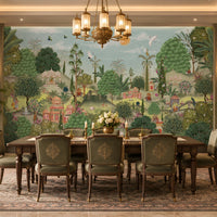 Aangan Bagh Mural – Hazel Blue featuring a lush Indian heritage garden with ornate pavilions, tropical foliage, birds, and intricate botanical details in soft hazel green and muted blue tones.
