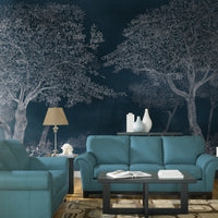 An architectural perspective of a sophisticated study featuring the Aranyam Mural in Charleston Green as a full-scale feature wall. The mural’s deep, illustrative vista pairs elegantly with dark wood textures and brass accents, creating a moody and cultured interior sanctuary.