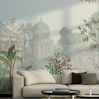 Blue floral mural wallpaper installed as a feature wall in living room, dining room, and bedroom interiors with botanical garden-inspired design.