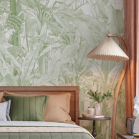 A high-resolution detail of the Banana Grove Dreams Pistachio Wallpaper, highlighting the delicate painterly textures and hand-painted veining of the tropical leaves. The image showcases the refined tonal transitions between cool mint, soft seafoam, and crisp white that define this nature-inspired mural.