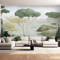 An architectural perspective of a contemporary living area featuring the Ethereal Landscapes Mural in Willow Green as a full-scale feature wall. The mural’s wide-angle scenic view pairs elegantly with light wood flooring and organic decor, creating a peaceful and cultured interior sanctuary.