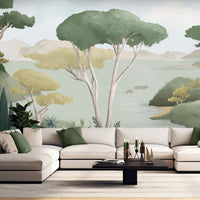 An architectural perspective of a contemporary living area featuring the Ethereal Landscapes Mural in Willow Green as a full-scale feature wall. The mural’s wide-angle scenic view pairs elegantly with light wood flooring and organic decor, creating a peaceful and cultured interior sanctuary.