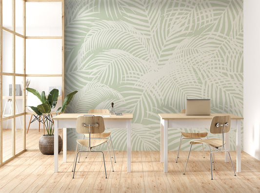 An architectural perspective of a contemporary, sunlit living area featuring the Exotic Foliage Mural as a full-scale feature wall. The mural’s soft green tones pair beautifully with natural wood furniture, cream linen textiles, and soft ambient light, creating a serene and sophisticated interior sanctuary.