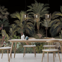 An architectural perspective of a contemporary foyer featuring the Exotic Palm Retreat Mural in Black Metal as a full-scale feature wall. The mural’s expansive botanical vista pairs strikingly with leather furniture and metallic accents, creating a peaceful and cultured interior sanctuary.