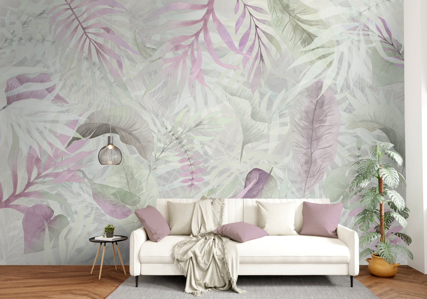 Silver pink colour Exotica Blend tropical leaf mural wallpaper installed as a feature wall in a living room, dining room, and bedroom, showcasing soft pink tones and modern tropical mural wallpaper design.