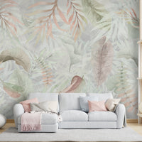 An architectural perspective of a contemporary, sunlit lounge featuring the Exotica Blend Mural as a full-scale accent wall. The mural’s muted pastels and grey tones pair elegantly with a light grey sectional, pale wood shelving, and minimalist decor, creating a serene and expansive modern living space.