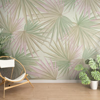 An architectural perspective of a contemporary minimalist lounge featuring the Fan Palm Leaves Mural as a full-scale feature wall. The mural’s soft, oversized botanical patterns pair elegantly with a mid-century modern wicker chair and light wood flooring, creating a serene and cultured interior sanctuary.