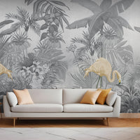 An architectural perspective of a contemporary lounge featuring the Flamingo Eden Mural in Savannah Gray as a full-scale feature wall. The mural’s desaturated botanical composition pairs elegantly with dark-toned furniture and minimalist accents, creating a peaceful and sophisticated urban retreat.