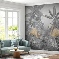 An architectural perspective of a contemporary lounge featuring the Flamingo Eden Mural in Savannah Gray as a full-scale feature wall. The mural’s desaturated botanical composition pairs elegantly with dark-toned furniture and minimalist accents, creating a peaceful and sophisticated urban retreat.
