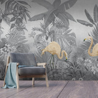 An architectural perspective of a contemporary lounge featuring the Flamingo Eden Mural in Savannah Gray as a full-scale feature wall. The mural’s desaturated botanical composition pairs elegantly with dark-toned furniture and minimalist accents, creating a peaceful and sophisticated urban retreat.