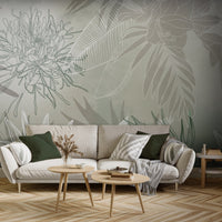 An architectural perspective of a contemporary living space featuring the Floral Fusion Mural as a full-scale feature wall. The mural’s soft sage tones pair elegantly with light wood herringbone flooring, cream-colored furniture, and deep forest green accents, creating a serene and cultured interior sanctuary.