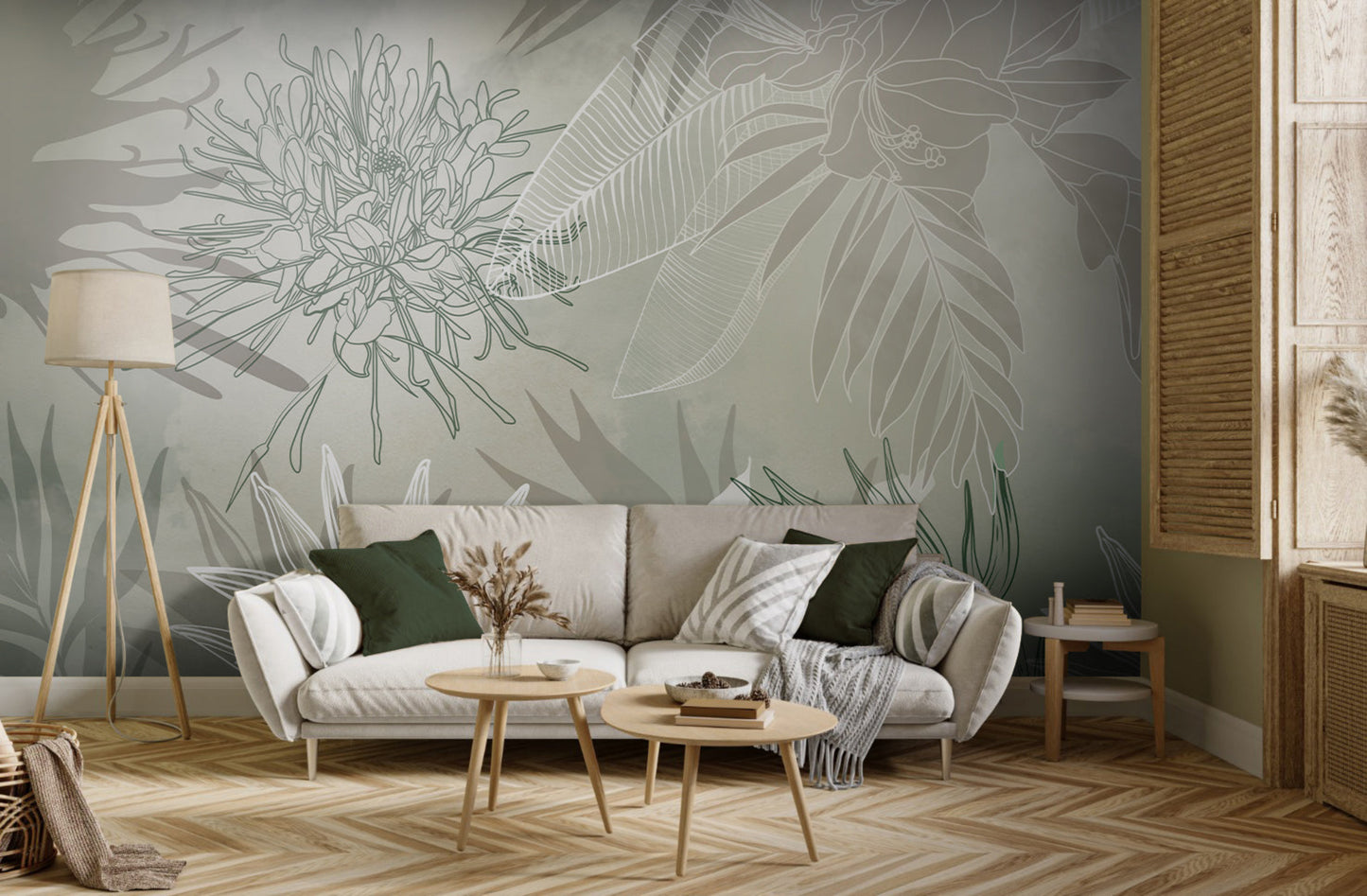 An architectural perspective of a contemporary living space featuring the Floral Fusion Mural as a full-scale feature wall. The mural’s soft sage tones pair elegantly with light wood herringbone flooring, cream-colored furniture, and deep forest green accents, creating a serene and cultured interior sanctuary.