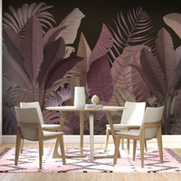 Raisin black botanical leaf mural wallpaper installed as a feature wall in living room, dining room, and bedroom interiors with bold tropical design.