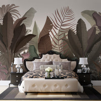 Silver pink botanical leaf mural wallpaper installed as a feature wall in living room, dining room, and bedroom interiors with elegant tropical design detailing.