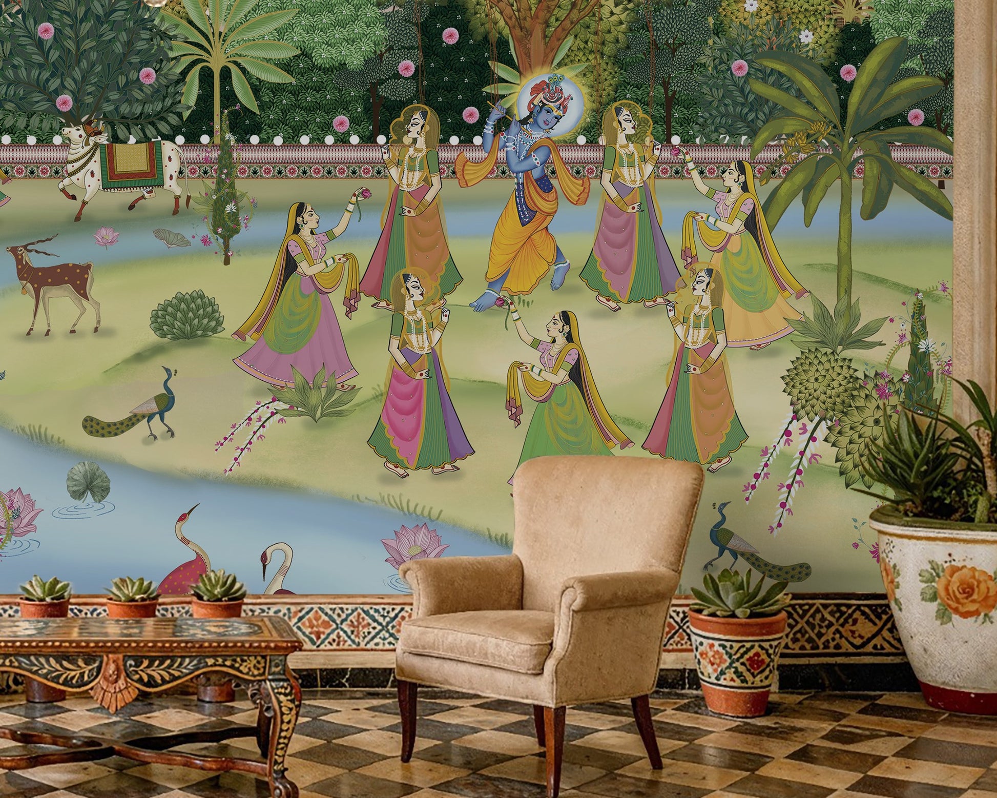 A high-resolution detail of the Krishna Pichwai Mural Wallpaper, showcasing the fine, traditional brushwork and ornamental detailing of the figures and flora. The image highlights the vibrant contrast between the saffron-clad Gopis and the rich, multi-tonal greenery of the Vrindavan landscape.