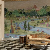 A panoramic architectural view of a luxury Indian palace interior featuring a full-scale Krishna Pichwai Mural Wallpaper. The mural depicts Lord Krishna in a sacred garden setting, paired with an ornate carved archway, checkered marble flooring, and traditional Rajasthani furniture.