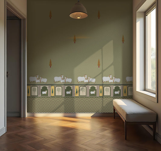 Green-toned interior room with patterned wallpaper featuring small animal motifs and a decorative border with plants and framed designs. A cushioned bench sits along the right wall beneath a window, while a hanging ceiling light is centered above. Sunlight enters through the window, casting soft shadows across the wall and wooden floor, with an open doorway visible on the left.